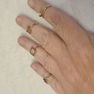 Rings four total gold tone